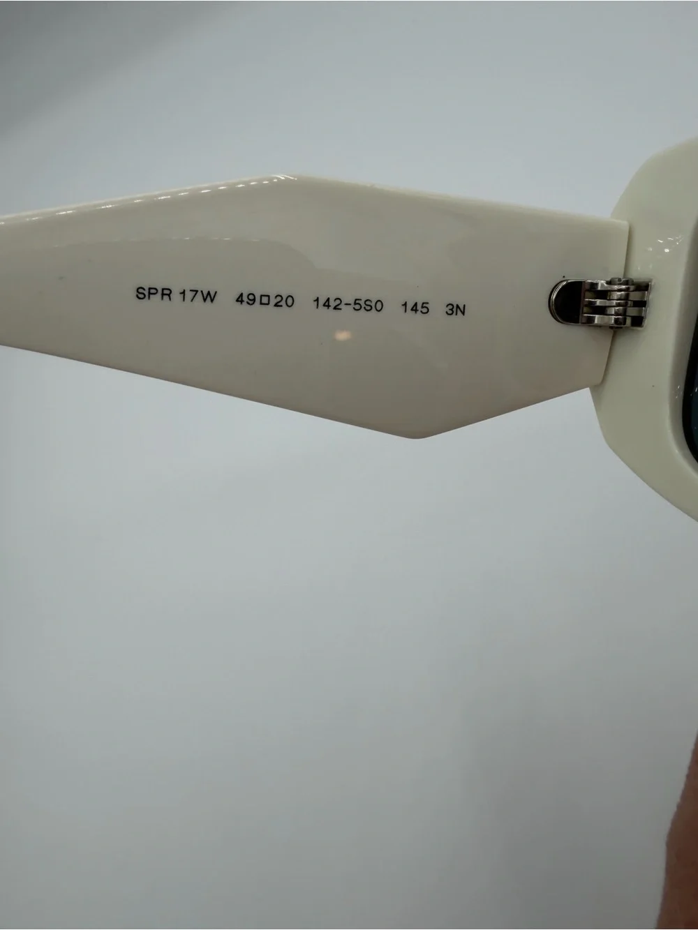 Prada White Glossy Frame Sunglasses with Dark Lenses